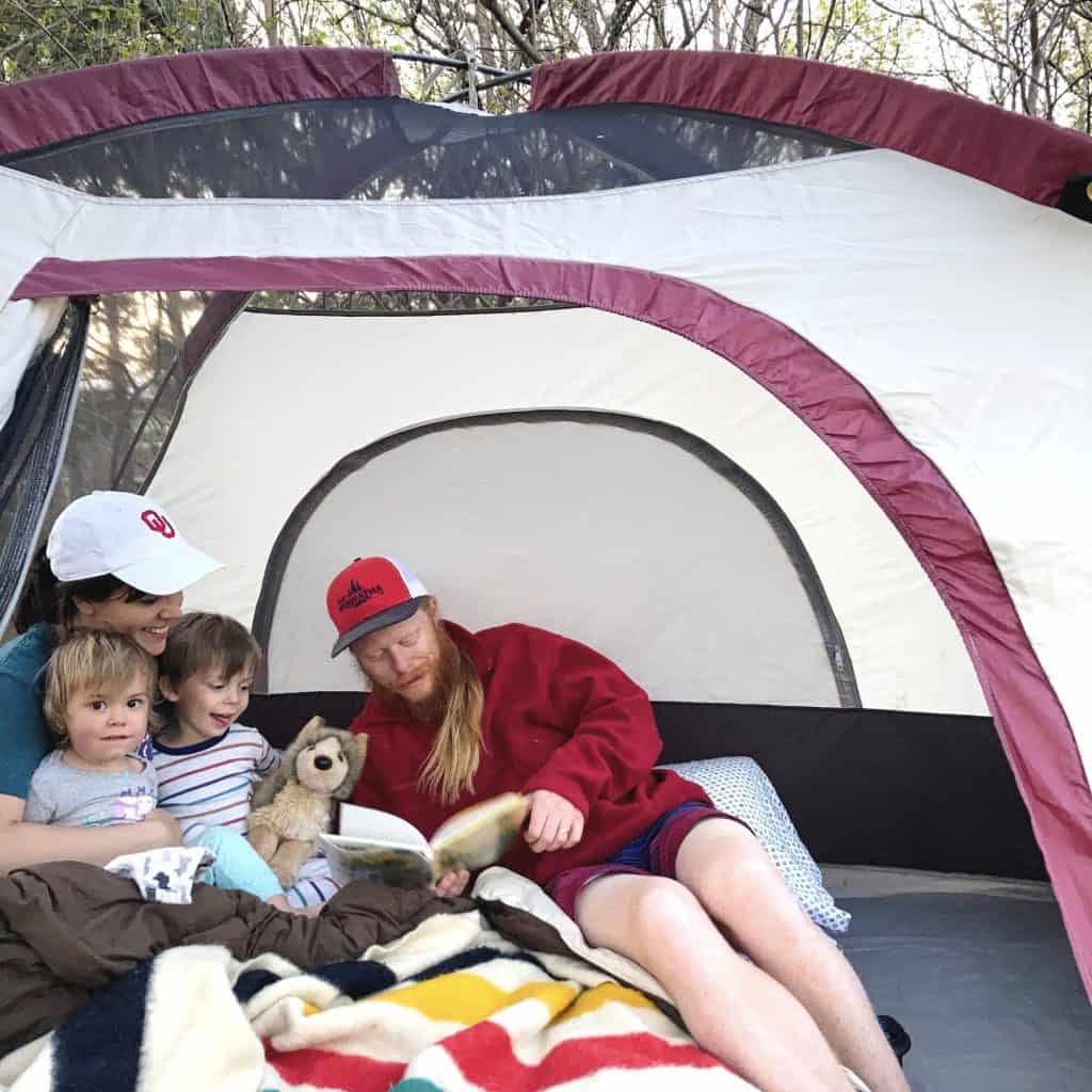 family camping in a tent